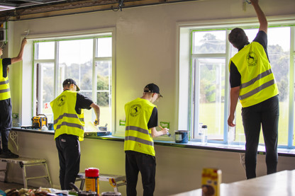 Young people getting construction experience working at Beeston Casuals Rugby Club with VIY