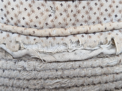 close-up of deteriorated fabric