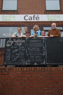 Trainees and supervisors outside of Rumbletums Cafe