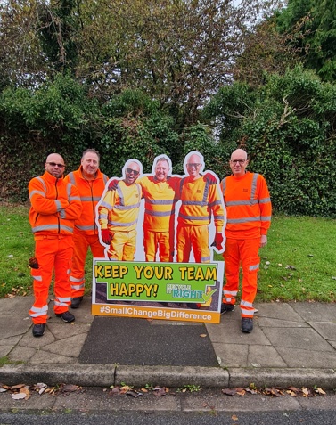 Damien, John and Karl with their cardboard cut out for recycle it right